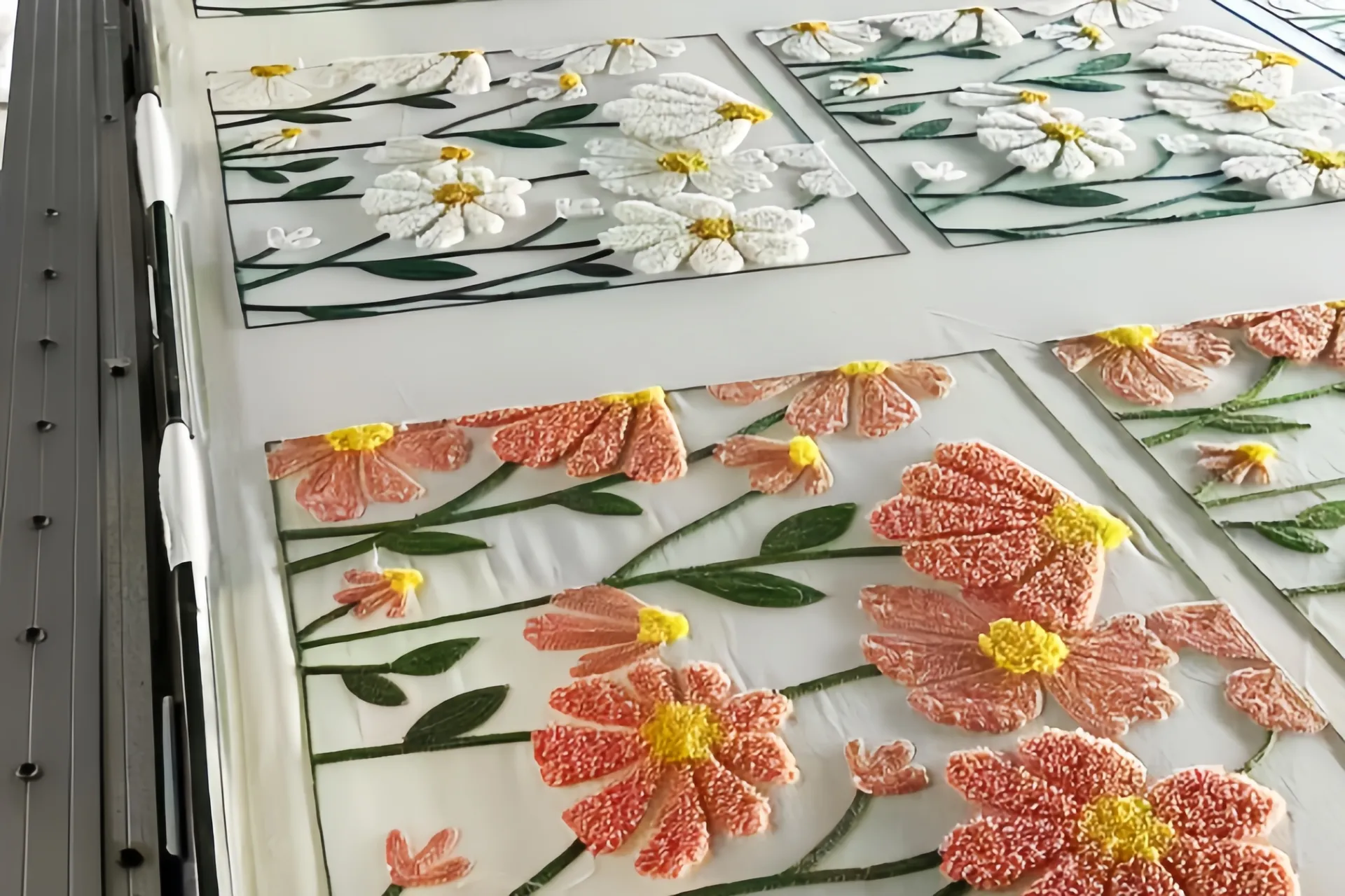 Colorful floral glass art panels with embossed flowers and leaves.