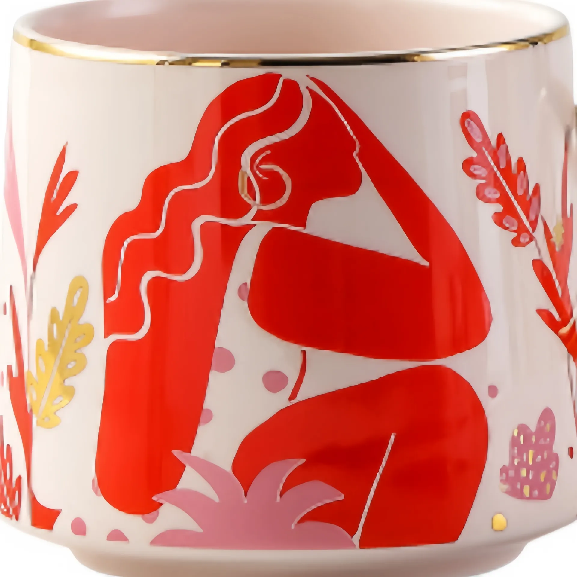 A mug with an artistic design featuring a red silhouette of a person surrounded by abstract floral patterns.